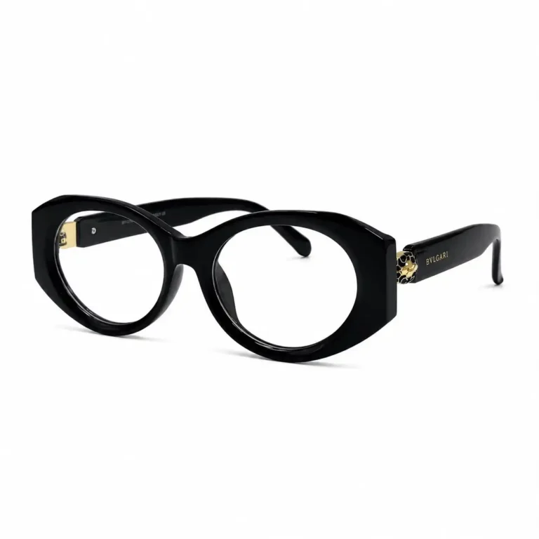 Optical EV2K-0100 Bold Oval Full Rim Eyeglasses in glossy Black with angular outer corners, wide temples and gold-tone textured temple accent
