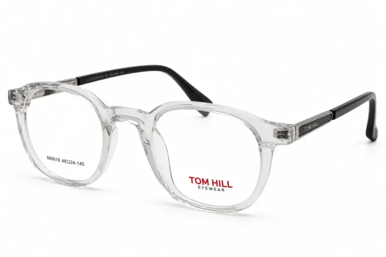 Optical EV2K-0150 Classic Round Full Rim Eyeglasses in Crystal Clear with transparent front and black temples with silver hinge plate