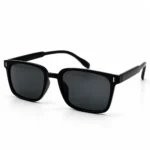Sunglass EV2K-0048 Modern Square Sunglasses in Glossy Black with grey tinted lenses, slim top bridge and small silver bar accents at the front corners