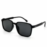 Sunglass EV2K-0052 Modern Square Sunglasses in Glossy Black with grey tinted lenses, softened corners and twin silver rivets on the temples