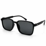 Sunglass EV2K-0052 Modern Square Sunglasses in Matte Black with grey tinted lenses, softened corners and twin silver rivets on the temples
