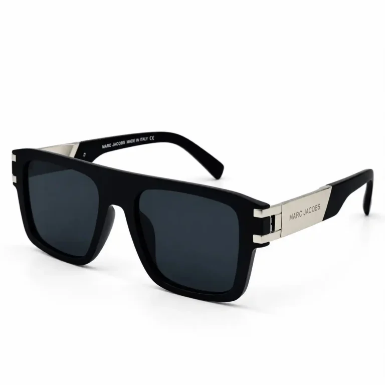 Bold flat top sunglasses in matte black with silver metal temple plates, dark grey lenses and a hinged side detail