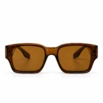 Retro square sunglasses in translucent crystal brown with warm brown lenses and clear triangle cut-out temple panels