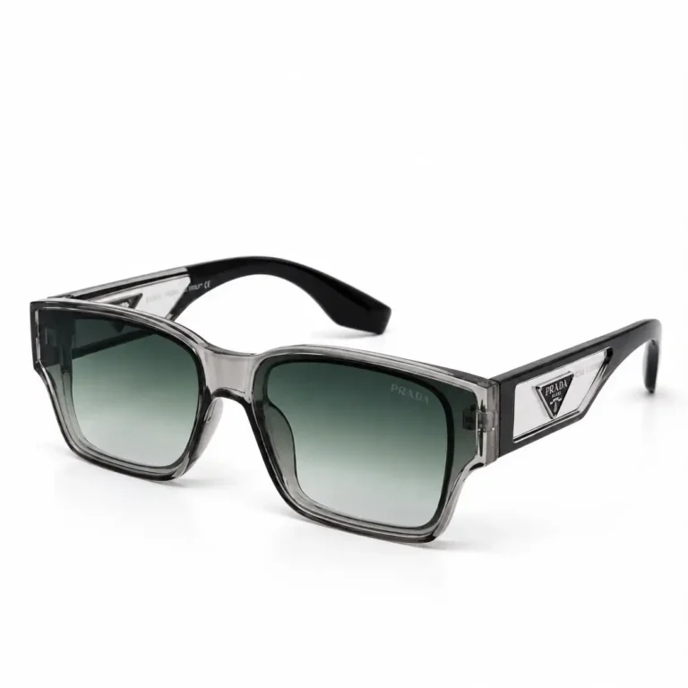 Stylish square sunglasses with a transparent grey crystal front, green gradient lenses, black temples and clear triangle cut-out panels