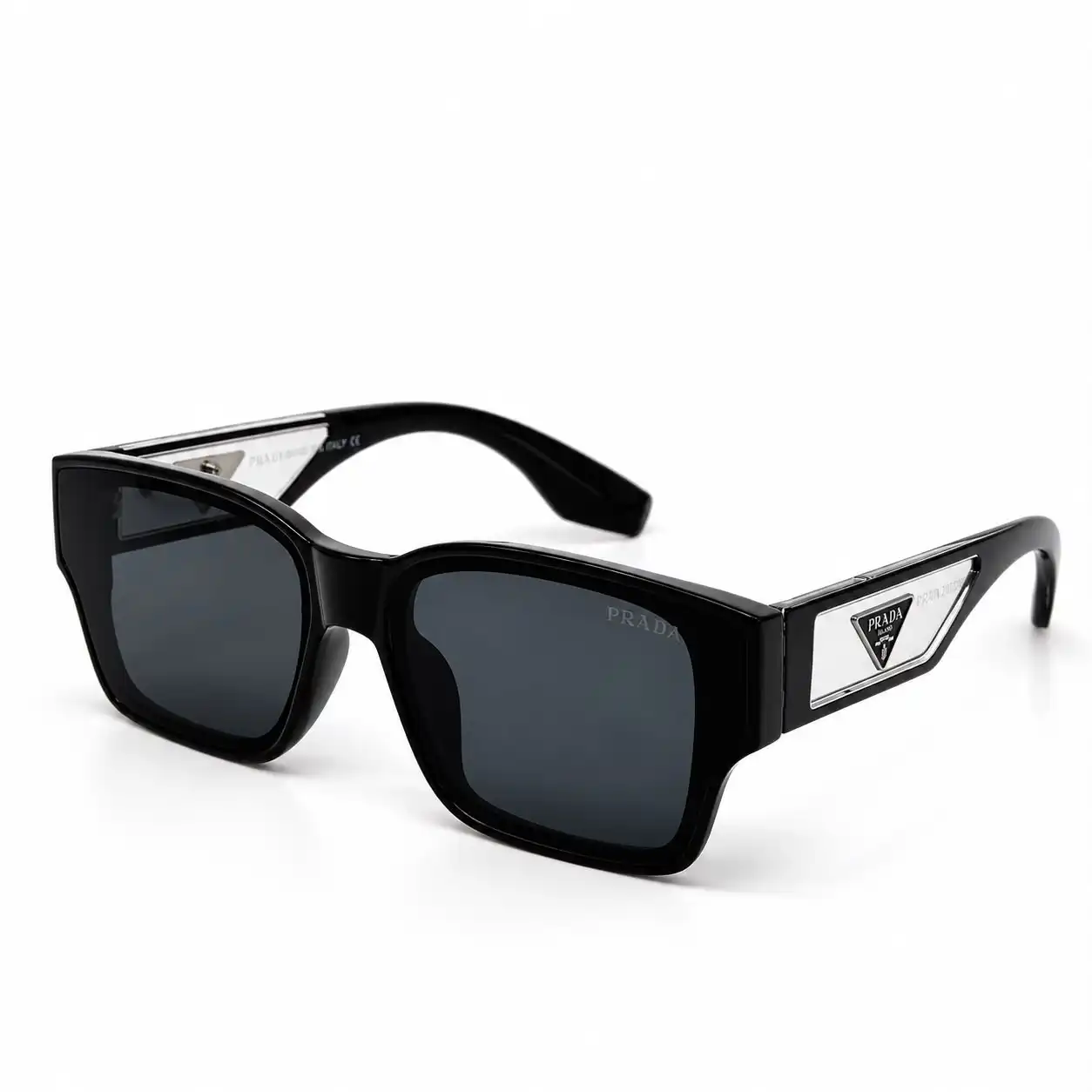 sunglass-spr0898s-glossy-black-square-sunglasses Bold square sunglasses in glossy black with dark grey lenses and wide temples with a clear triangle cut-out panel